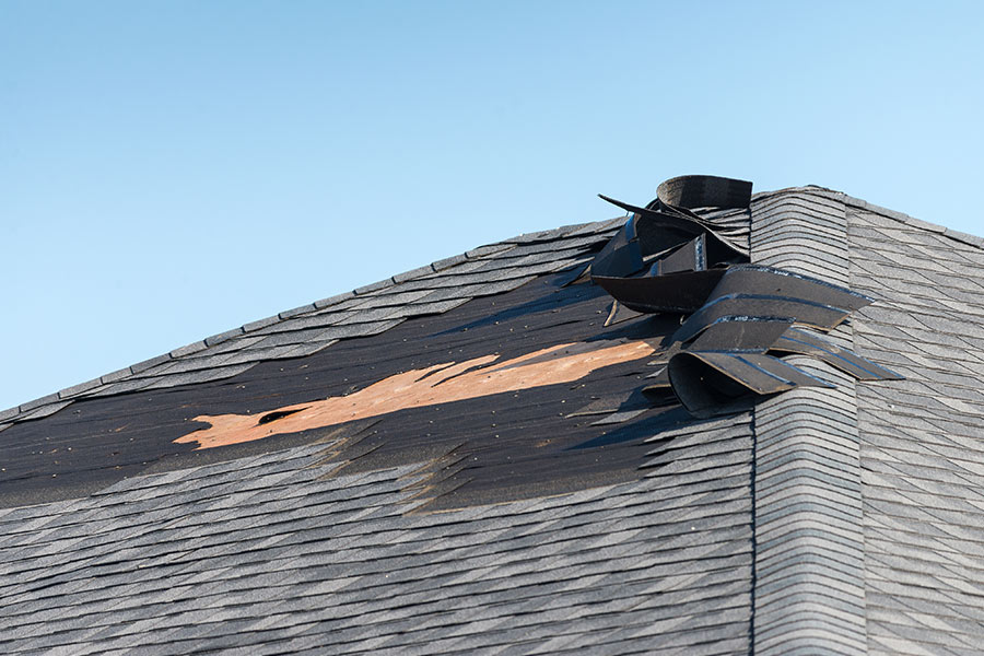 damaged shingles roof close up converse-tx