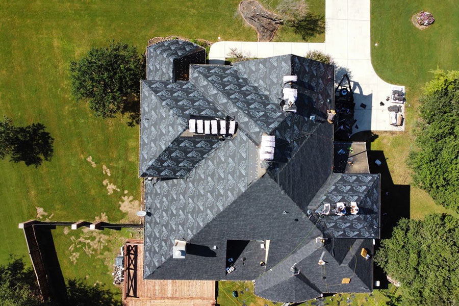 top view of residential property with asphalt shingles roof replacement in process converse-tx
